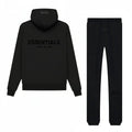 Fear of God Essentials Limo Black — ensemble Stretch Limo noir intense oversize