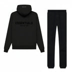 Fear of God Essentials Limo Black — ensemble Stretch Limo noir intense oversize